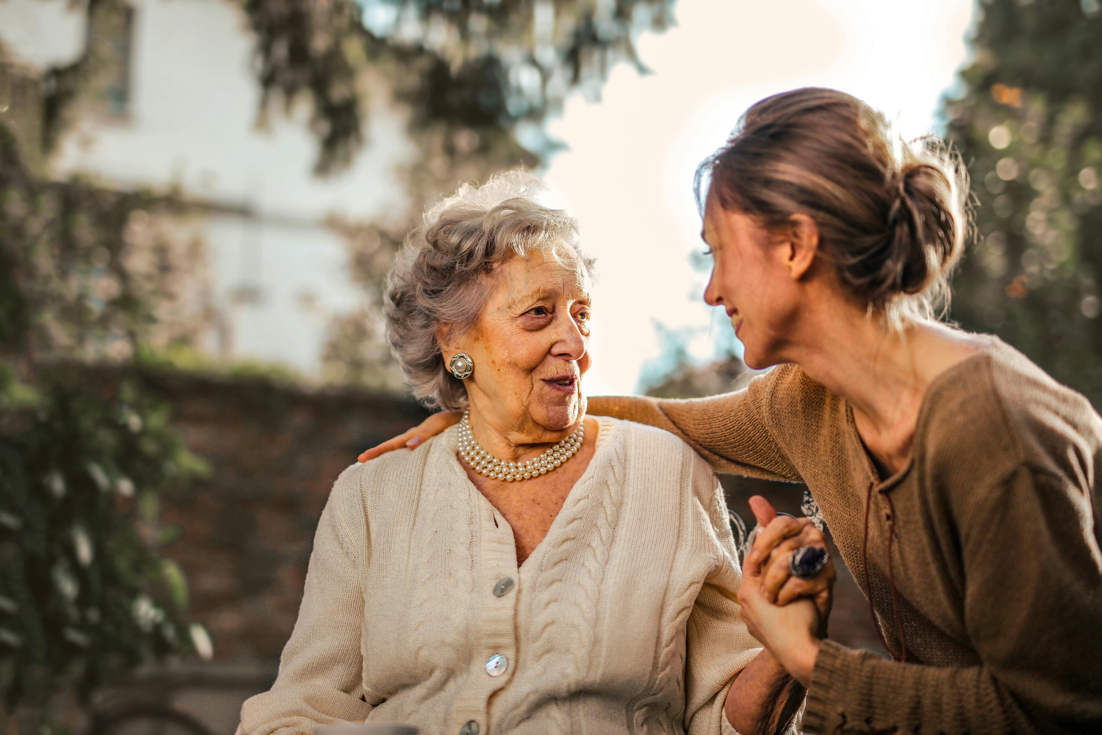 Care professional visiting a client at home